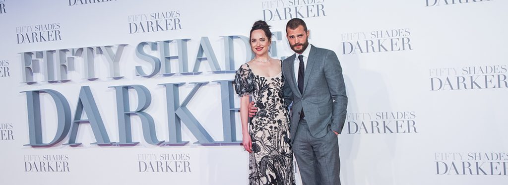 Actors Dakota Johnson and Jamie Dornan pose for photographers upon arrival at the premiere of the film 'Fifty Shades Darker', in London, Thursday, Feb. 9, 2017. (Photo by Vianney Le Caer/Invision/AP)